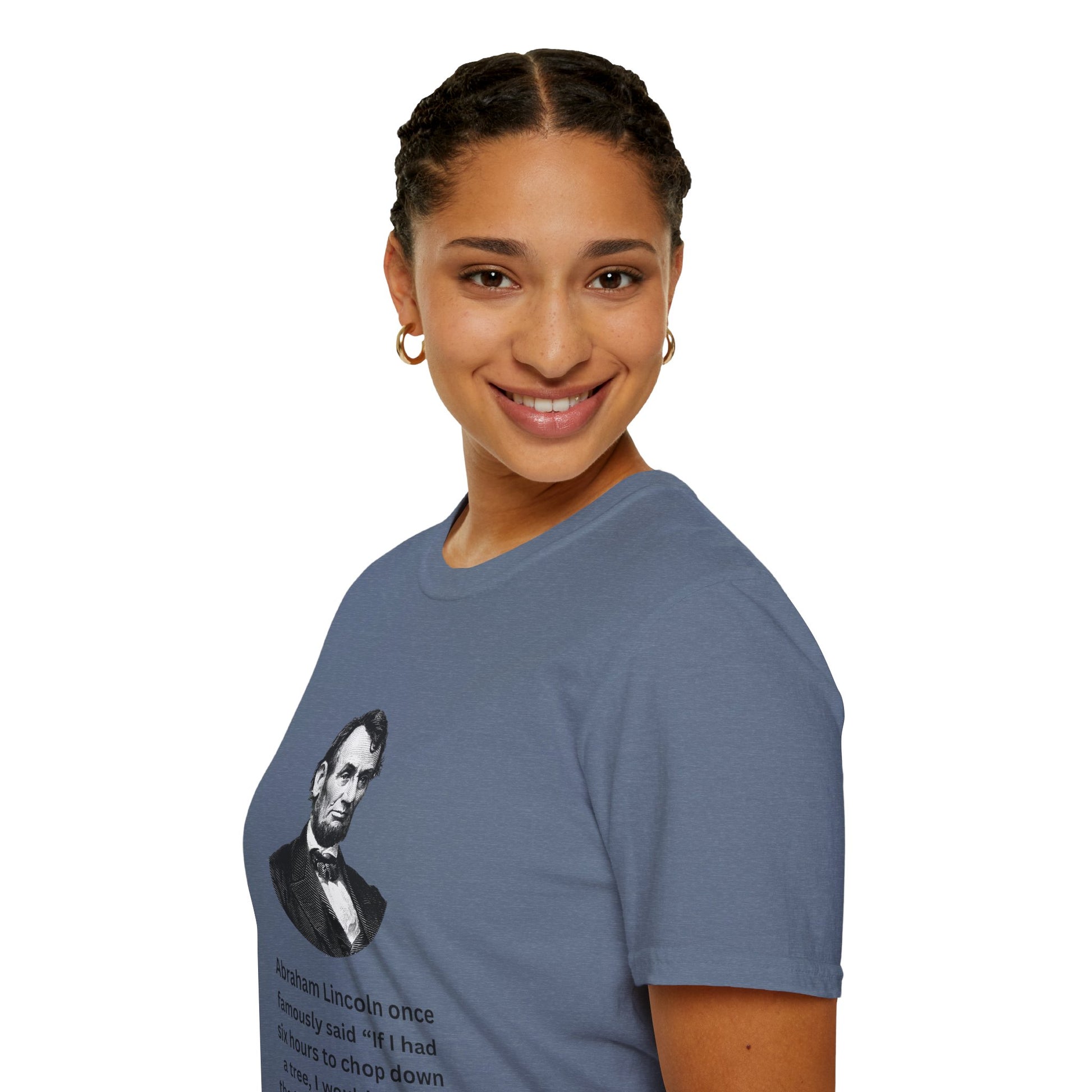Woman modeling dark blue Abraham Lincoln gambling t-shirt with bold design.”