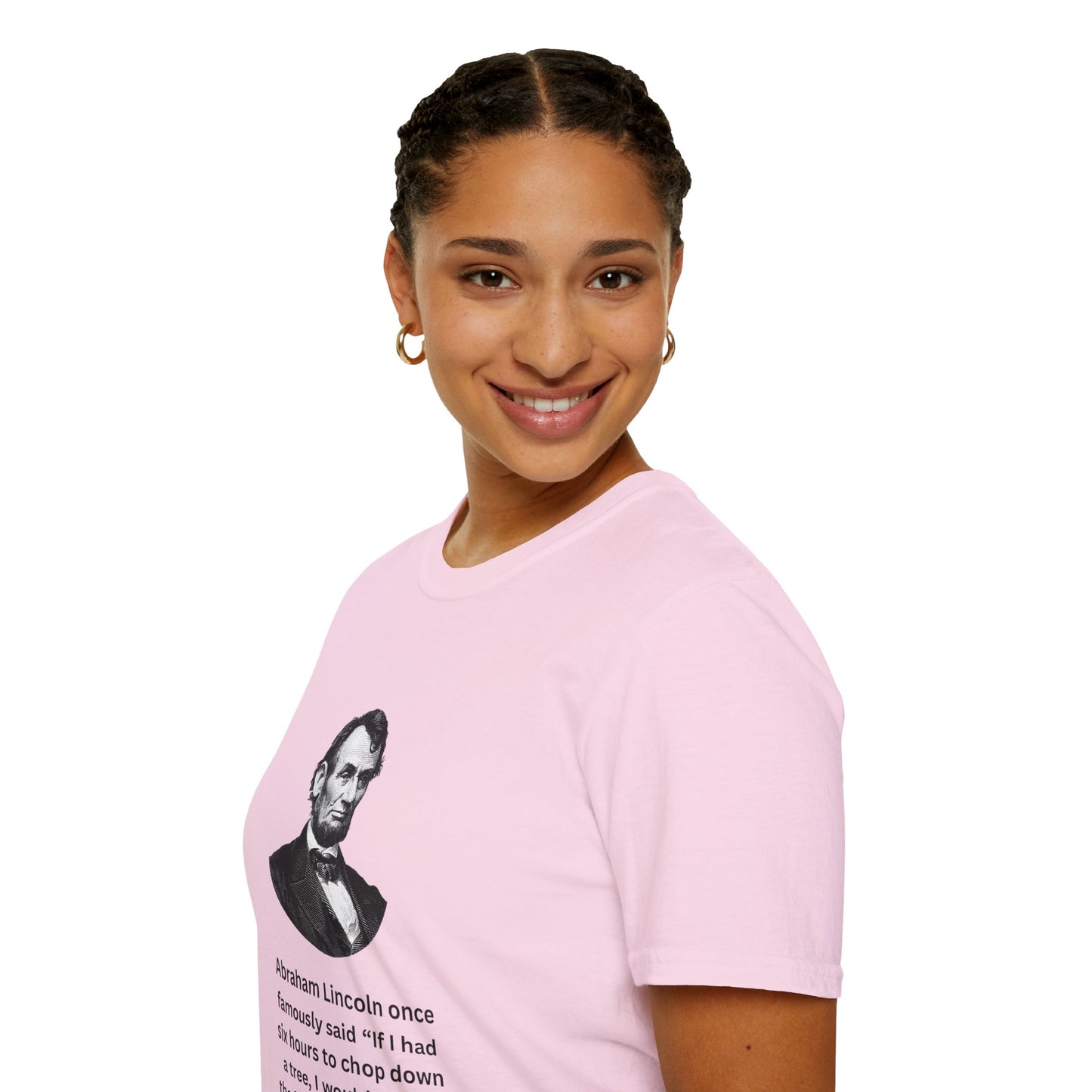 Woman in pink Lincoln quote shirt smiling, showing off funny historical tee.